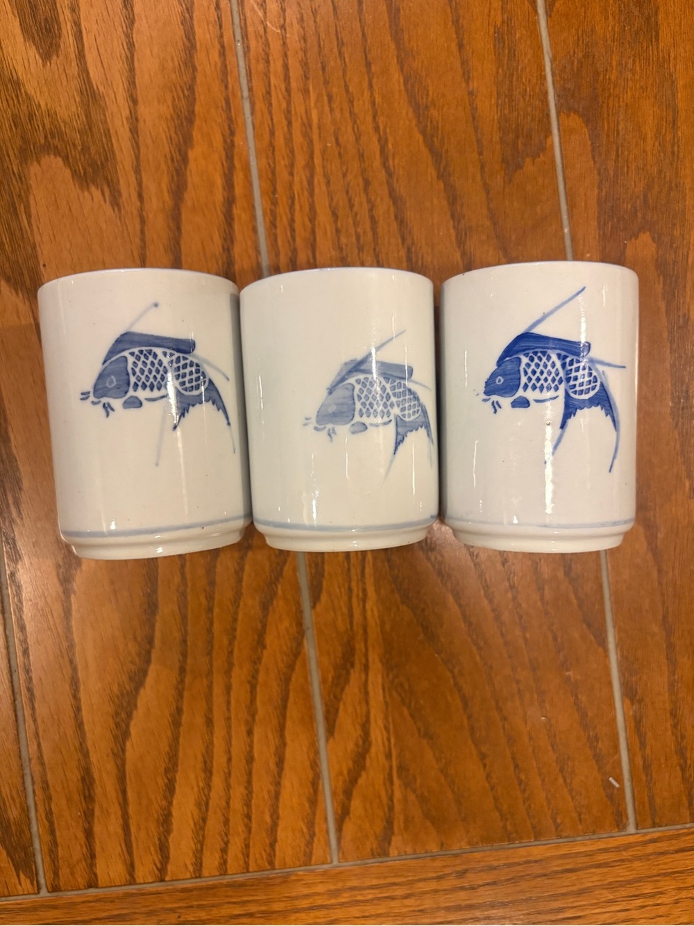 Pier 1 White Ceramic Tea or Sake Cups with Blue Koi Fish Design set of 3
